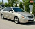 Бежевий Кіа Черато, об'ємом двигуна 2 л та пробігом 250 тис. км за 3500 $, фото 1 на Automoto.ua