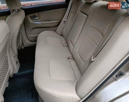 Бежевый Киа Черато, объемом двигателя 2 л и пробегом 195 тыс. км за 4250 $, фото 9 на Automoto.ua