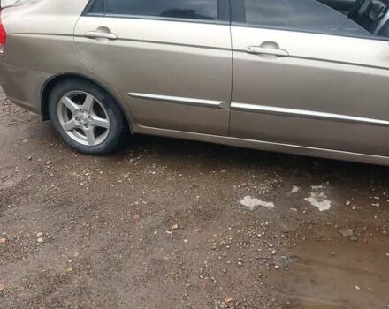 Бежевый Киа Черато, объемом двигателя 2 л и пробегом 245 тыс. км за 4500 $, фото 9 на Automoto.ua