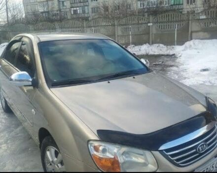 Бежевий Кіа Черато, об'ємом двигуна 2 л та пробігом 222 тис. км за 4900 $, фото 2 на Automoto.ua