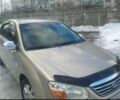 Бежевий Кіа Черато, об'ємом двигуна 2 л та пробігом 222 тис. км за 4900 $, фото 2 на Automoto.ua