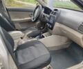 Бежевий Кіа Черато, об'ємом двигуна 1.6 л та пробігом 280 тис. км за 3300 $, фото 4 на Automoto.ua