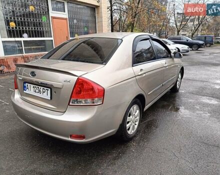 Бежевый Киа Черато, объемом двигателя 2 л и пробегом 195 тыс. км за 4250 $, фото 4 на Automoto.ua