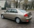Бежевый Киа Черато, объемом двигателя 1.6 л и пробегом 218 тыс. км за 5200 $, фото 3 на Automoto.ua