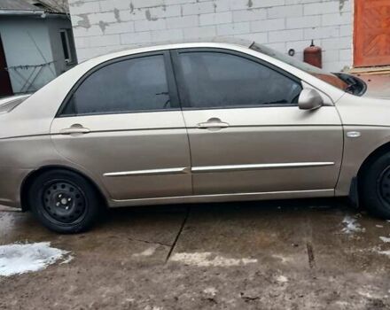 Бежевый Киа Черато, объемом двигателя 2 л и пробегом 245 тыс. км за 4500 $, фото 22 на Automoto.ua