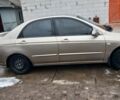 Бежевый Киа Черато, объемом двигателя 2 л и пробегом 245 тыс. км за 4500 $, фото 22 на Automoto.ua
