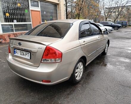 Бежевый Киа Черато, объемом двигателя 2 л и пробегом 195 тыс. км за 4250 $, фото 1 на Automoto.ua