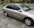 Бежевый Киа Черато, объемом двигателя 1.6 л и пробегом 185 тыс. км за 5000 $, фото 4 на Automoto.ua