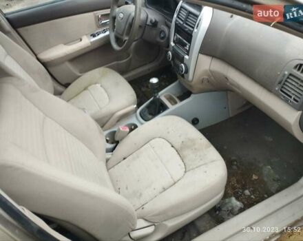 Бежевый Киа Черато, объемом двигателя 1.59 л и пробегом 208 тыс. км за 1900 $, фото 14 на Automoto.ua