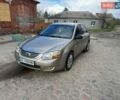 Бежевий Кіа Черато, об'ємом двигуна 1.59 л та пробігом 182 тис. км за 3900 $, фото 1 на Automoto.ua