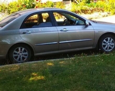 Бежевий Кіа Черато, об'ємом двигуна 2 л та пробігом 222 тис. км за 4900 $, фото 4 на Automoto.ua