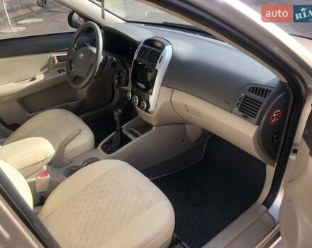 Бежевий Кіа Черато, об'ємом двигуна 1.6 л та пробігом 118 тис. км за 5400 $, фото 8 на Automoto.ua