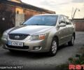 Бежевый Киа Черато, объемом двигателя 2 л и пробегом 218 тыс. км за 4450 $, фото 1 на Automoto.ua