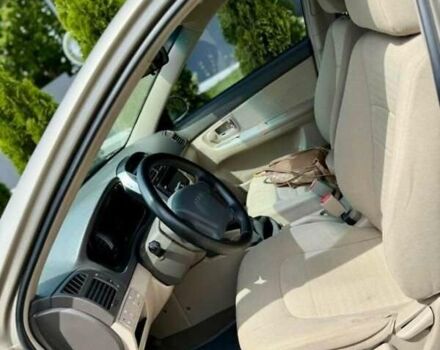 Бежевий Кіа Черато, об'ємом двигуна 2 л та пробігом 250 тис. км за 3500 $, фото 4 на Automoto.ua