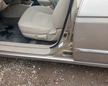 Бежевый Киа Черато, объемом двигателя 2 л и пробегом 245 тыс. км за 4500 $, фото 11 на Automoto.ua