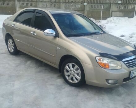 Бежевий Кіа Черато, об'ємом двигуна 2 л та пробігом 222 тис. км за 4900 $, фото 1 на Automoto.ua