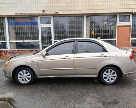 Бежевый Киа Черато, объемом двигателя 2 л и пробегом 195 тыс. км за 4250 $, фото 4 на Automoto.ua