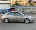 Бежевий Кіа Черато, об'ємом двигуна 1.6 л та пробігом 189 тис. км за 5940 $, фото 3 на Automoto.ua