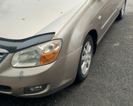 Бежевий Кіа Черато, об'ємом двигуна 2 л та пробігом 222 тис. км за 4900 $, фото 5 на Automoto.ua