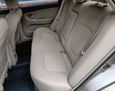 Бежевый Киа Черато, объемом двигателя 2 л и пробегом 195 тыс. км за 4250 $, фото 8 на Automoto.ua