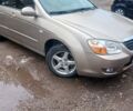 Бежевый Киа Черато, объемом двигателя 2 л и пробегом 245 тыс. км за 4900 $, фото 1 на Automoto.ua