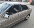 Бежевый Киа Черато, объемом двигателя 1.59 л и пробегом 322 тыс. км за 3900 $, фото 2 на Automoto.ua