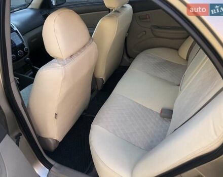 Бежевий Кіа Черато, об'ємом двигуна 1.6 л та пробігом 118 тис. км за 5400 $, фото 11 на Automoto.ua