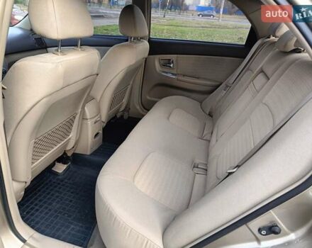 Бежевый Киа Черато, объемом двигателя 1.98 л и пробегом 195 тыс. км за 3993 $, фото 8 на Automoto.ua