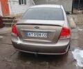 Бежевый Киа Черато, объемом двигателя 2 л и пробегом 245 тыс. км за 4500 $, фото 21 на Automoto.ua
