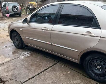 Бежевый Киа Черато, объемом двигателя 2 л и пробегом 245 тыс. км за 4500 $, фото 20 на Automoto.ua