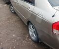 Бежевый Киа Черато, объемом двигателя 2 л и пробегом 245 тыс. км за 4900 $, фото 8 на Automoto.ua