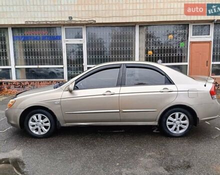 Бежевый Киа Черато, объемом двигателя 2 л и пробегом 195 тыс. км за 4250 $, фото 2 на Automoto.ua