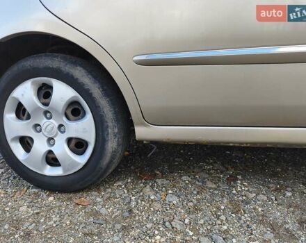 Бежевий Кіа Черато, об'ємом двигуна 1.59 л та пробігом 155 тис. км за 3700 $, фото 12 на Automoto.ua