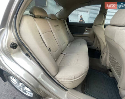 Бежевый Киа Черато, объемом двигателя 1.6 л и пробегом 220 тыс. км за 3500 $, фото 8 на Automoto.ua