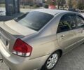 Бежевий Кіа Черато, об'ємом двигуна 1.6 л та пробігом 247 тис. км за 5100 $, фото 6 на Automoto.ua
