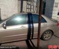 Бежевый Киа Черато, объемом двигателя 1.6 л и пробегом 240 тыс. км за 1600 $, фото 2 на Automoto.ua