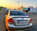 Бежевый Киа Черато, объемом двигателя 1.6 л и пробегом 186 тыс. км за 5000 $, фото 1 на Automoto.ua