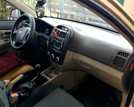 Бежевый Киа Черато, объемом двигателя 1.6 л и пробегом 118 тыс. км за 4300 $, фото 5 на Automoto.ua