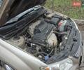 Бежевый Киа Черато, объемом двигателя 2 л и пробегом 210 тыс. км за 5300 $, фото 16 на Automoto.ua