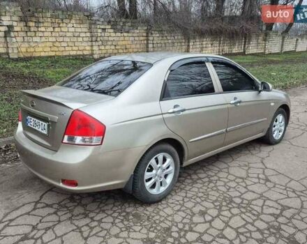Бежевый Киа Черато, объемом двигателя 2 л и пробегом 210 тыс. км за 5300 $, фото 4 на Automoto.ua