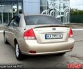 Бежевый Киа Черато, объемом двигателя 2 л и пробегом 255 тыс. км за 3700 $, фото 1 на Automoto.ua