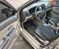 Бежевый Киа Черато, объемом двигателя 2 л и пробегом 210 тыс. км за 5300 $, фото 10 на Automoto.ua