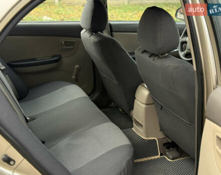 Бежевий Кіа Черато, об'ємом двигуна 1.58 л та пробігом 287 тис. км за 4800 $, фото 9 на Automoto.ua