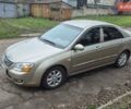 Бежевый Киа Черато, объемом двигателя 2 л и пробегом 210 тыс. км за 5300 $, фото 1 на Automoto.ua