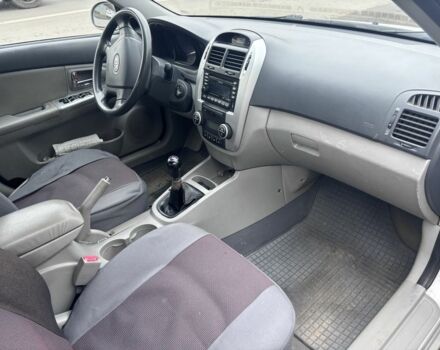 Бежевый Киа Черато, объемом двигателя 2 л и пробегом 160 тыс. км за 4500 $, фото 5 на Automoto.ua