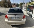 Бежевий Кіа Черато, об'ємом двигуна 1.6 л та пробігом 247 тис. км за 5100 $, фото 1 на Automoto.ua