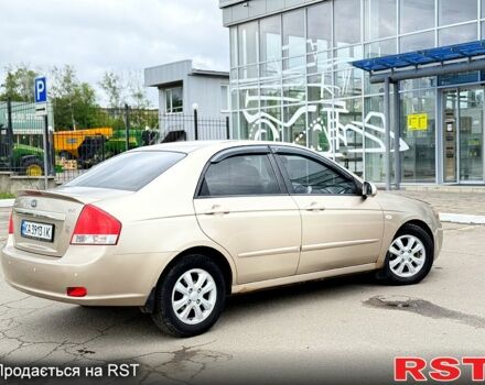 Бежевый Киа Черато, объемом двигателя 2 л и пробегом 255 тыс. км за 3700 $, фото 4 на Automoto.ua