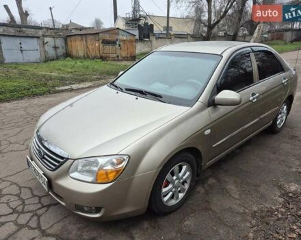 Бежевый Киа Черато, объемом двигателя 2 л и пробегом 210 тыс. км за 5300 $, фото 3 на Automoto.ua