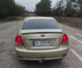 Бежевый Киа Черато, объемом двигателя 1.6 л и пробегом 305 тыс. км за 4500 $, фото 7 на Automoto.ua