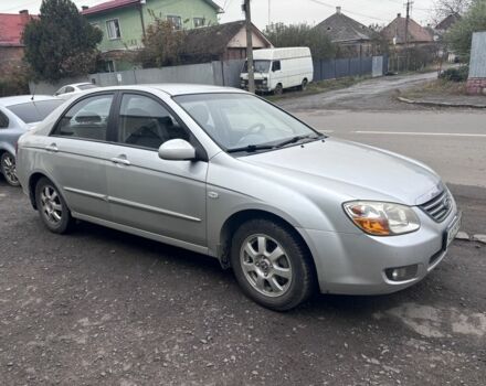 Бежевый Киа Черато, объемом двигателя 2 л и пробегом 160 тыс. км за 4500 $, фото 1 на Automoto.ua